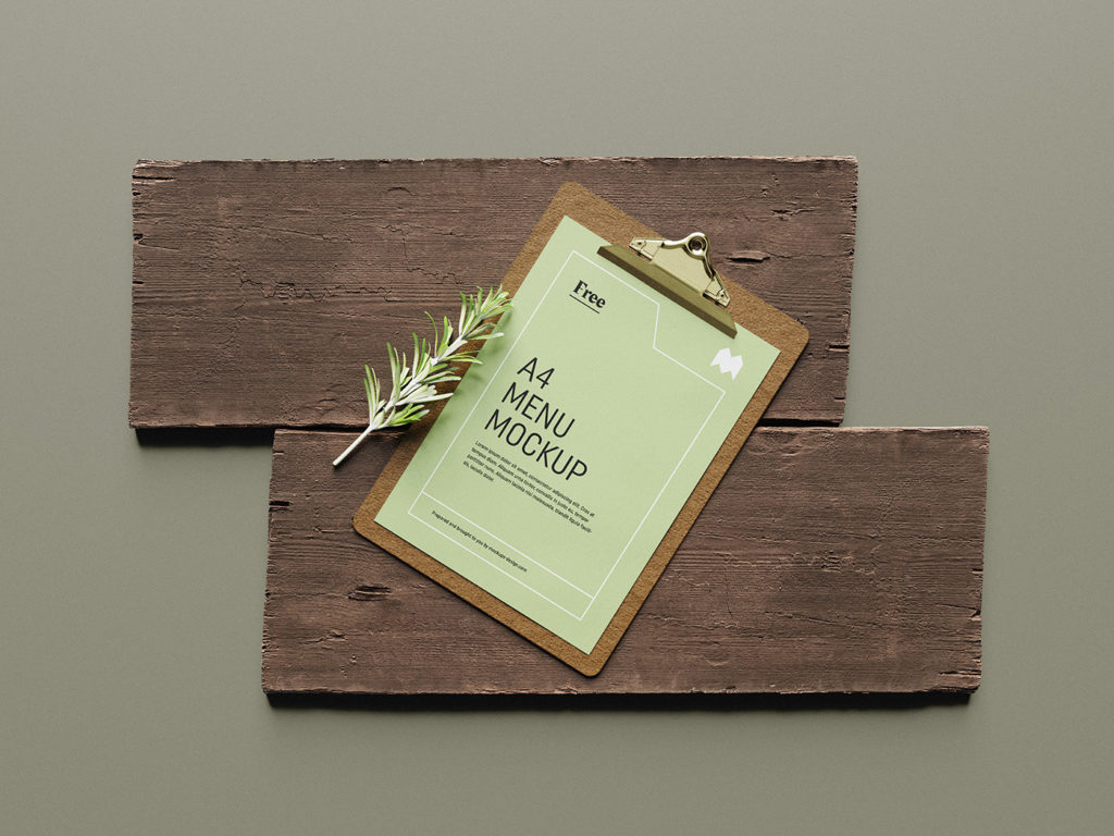 menu mockup free on clipboard and with wood background